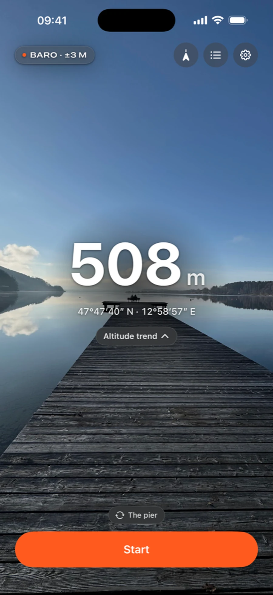 The VERT altimeter showing 508 metres over a still lake and a wooden jetty